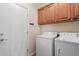 Convenient laundry room with washer and dryer included at 30130 N Jillian Dr, San Tan Valley, AZ 85143