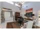 Elegant living room featuring high ceilings, a grand piano, and ornate decor at 3047 E Marshall Ave, Phoenix, AZ 85016