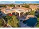 Luxury home with a pool, spa, and expansive backyard at 3447 E Kenwood St, Mesa, AZ 85213