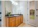 Elegant bathroom with granite vanity and large mirror at 3447 E Kenwood St, Mesa, AZ 85213