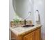 Powder room with copper sink and granite countertop at 3447 E Kenwood St, Mesa, AZ 85213