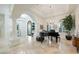 Elegant entryway with piano and decorative accents at 3447 E Kenwood St, Mesa, AZ 85213