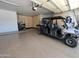 Garage with storage and a Polaris RZR at 3447 E Kenwood St, Mesa, AZ 85213