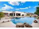 Resort-style pool with a diving board and spacious patio area at 3447 E Kenwood St, Mesa, AZ 85213