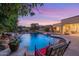 Inviting pool and spa with tranquil waterfall feature at 3447 E Kenwood St, Mesa, AZ 85213