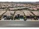 Aerial view of house and surrounding neighborhood at 36168 N Stoneware Dr, Queen Creek, AZ 85140