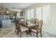 Elegant dining room with a large table and six chairs at 36168 N Stoneware Dr, Queen Creek, AZ 85140