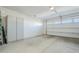 Clean and spacious garage with ample storage at 36168 N Stoneware Dr, Queen Creek, AZ 85140