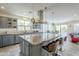 Spacious kitchen with granite countertops and stainless steel appliances at 36168 N Stoneware Dr, Queen Creek, AZ 85140