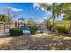 Large backyard with grassy area, sparkling pool, and fenced enclosure at 3639 E San Pedro Ave, Gilbert, AZ 85234