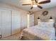 Bedroom with queen bed, built-in closet, and farmhouse decor at 3639 E San Pedro Ave, Gilbert, AZ 85234