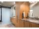 Modern bathroom with granite countertops and large cabinets at 38484 N 94Th St, Scottsdale, AZ 85262