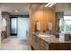 Modern bathroom with granite countertops, large cabinets, and a walk-in shower at 38484 N 94Th St, Scottsdale, AZ 85262