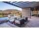 Modern patio furniture near a refreshing pool with mountain views at 38484 N 94Th St, Scottsdale, AZ 85262