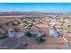 Aerial view showing a house, detached garage, and expansive desert lot at 3936 E Ascot Dr, San Tan Valley, AZ 85140