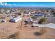 Aerial view of property showing house, detached garage, and large lot at 3936 E Ascot Dr, San Tan Valley, AZ 85140