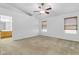 Bright bedroom with ceiling fan and carpet flooring at 3936 E Ascot Dr, San Tan Valley, AZ 85140