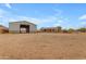 Aerial view shows house and detached garage on large lot at 3936 E Ascot Dr, San Tan Valley, AZ 85140