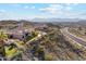 Breathtaking mountain view from this home on a hillside with a putting green and inviting pool at 402 E Windmere Dr, Phoenix, AZ 85048