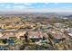 Scenic aerial view of a Primary-planned community featuring beautiful homes and stunning natural landscape at 402 E Windmere Dr, Phoenix, AZ 85048