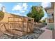 Backyard view of a custom garden box featuring a beautiful landscaped yard at 402 E Windmere Dr, Phoenix, AZ 85048