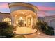 Close-up of the grand entrance, highlighting the custom double doors and architectural details at 402 E Windmere Dr, Phoenix, AZ 85048