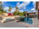 Stunning backyard with a large pool, spa, and fire pit; perfect for entertaining at 4176 E Glacier Pl, Chandler, AZ 85249