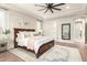 Bright bedroom featuring a king-size bed and ensuite access at 4176 E Glacier Pl, Chandler, AZ 85249