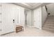 Bright entryway with tile flooring, a staircase, and a coat closet at 4176 E Glacier Pl, Chandler, AZ 85249