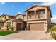 Two-story house with a large garage and landscaped front yard at 4176 E Glacier Pl, Chandler, AZ 85249