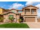 Two-story house with a large garage and landscaped front yard at 4176 E Glacier Pl, Chandler, AZ 85249