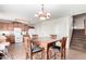 Kitchen and adjacent dining area with stairs visible at 4322 E Whitehall Dr, San Tan Valley, AZ 85140