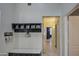 Hallway with coat rack and storage bench at 4329 E Swilling Rd, Phoenix, AZ 85050