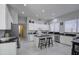 Modern kitchen with white cabinets and granite counters at 4329 E Swilling Rd, Phoenix, AZ 85050