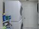 Stackable washer and dryer in a bright laundry room at 4329 E Swilling Rd, Phoenix, AZ 85050