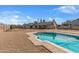 Spacious backyard featuring a pool, patio, and ample space for outdoor activities at 4542 W Villa Theresa Dr, Glendale, AZ 85308