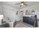 Comfortable Bedroom room with a changing table, dresser, and neutral decor at 4542 W Villa Theresa Dr, Glendale, AZ 85308