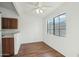 Simple dining area with wood flooring and large window at 455 S Delaware Dr # 154, Apache Junction, AZ 85120