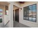 Condo entryway with security door and window, showing tiled flooring at 455 S Delaware Dr # 154, Apache Junction, AZ 85120