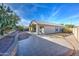 Spacious backyard with a patio and gravel landscaping at 5153 W Pontiac Dr, Glendale, AZ 85308