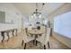 Kitchen adjacent dining area with four-chair table at 5153 W Pontiac Dr, Glendale, AZ 85308