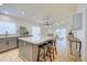 Modern kitchen with island, stainless steel appliances, and white cabinets at 5153 W Pontiac Dr, Glendale, AZ 85308