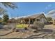 Backyard view, showing patio and landscaping at 5251 W Posse Dr, Eloy, AZ 85131