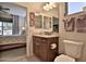 Bathroom with toilet and vanity, bedroom view at 5251 W Posse Dr, Eloy, AZ 85131