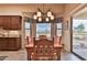 Kitchen dining area with wood table and view at 5251 W Posse Dr, Eloy, AZ 85131