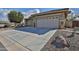 Two-car garage with decorative accents at 5251 W Posse Dr, Eloy, AZ 85131