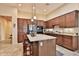 Well-equipped kitchen with wood cabinetry at 5251 W Posse Dr, Eloy, AZ 85131