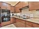 Kitchen with granite counters and stainless steel appliances at 5251 W Posse Dr, Eloy, AZ 85131