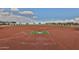 Community softball field with bases and outfield at 5251 W Posse Dr, Eloy, AZ 85131