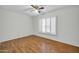 Spacious bedroom with hardwood floors and window shutters at 5331 W Mescal St, Glendale, AZ 85304